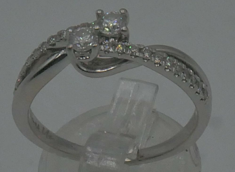14KT WHITE GOLD FASHION RING SIZE 9; 4.1 GR; W 0.50 PTS ROUND DIAMONDS. PRE OWNED. VERY GOOD CONDITION. WITH 22 SMALL ROUND DIAMONDS APPROXIMATELY 0.2