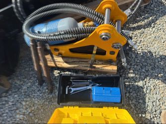 Mini excavator jackhammer attachment
