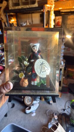 Asian style woman in glass decor