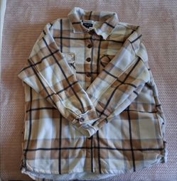 helium cream and brown w/ black stripes. absolutely loved it, it says 3x but it fits xl too!. p.s. it looks like a button is missing but it's not.