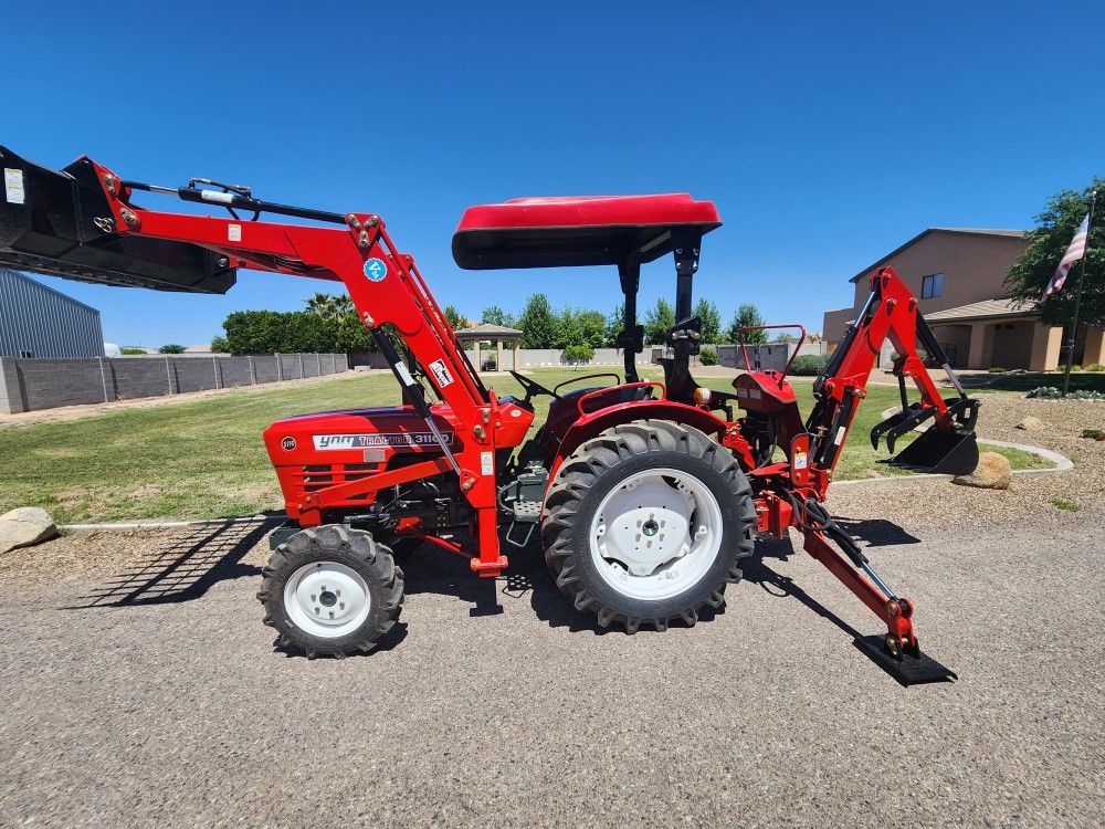 YNM 3110D Tracor And Backhoe