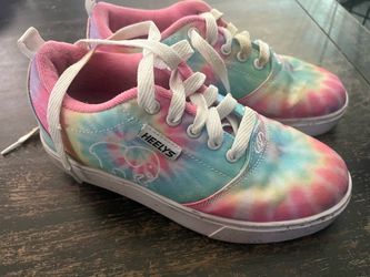 Heelys size yth 4 and wo’s 5