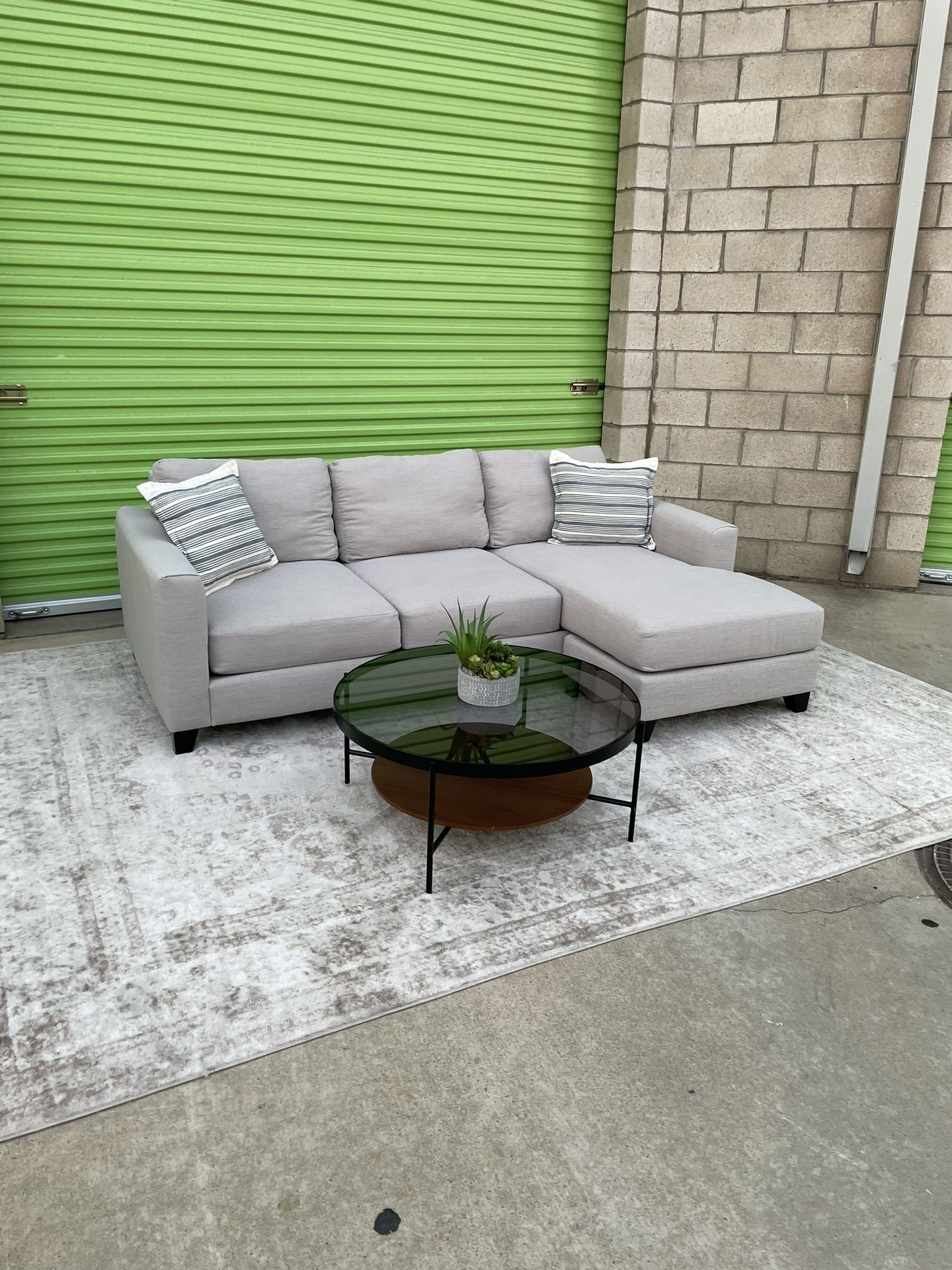 *Free Delivery* Gray Living Spaces Sectional Reversible Chaise