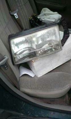 96 97 98 Cadillac Seville Deville head light