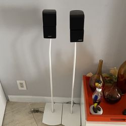 Bose Cube Speakers w/stands Plus a center speaker