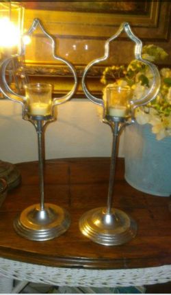 Stunning✨ Pair of candle sticks. They each have a little glass holder for tealight camdles. Silver w/ flecks of gold.