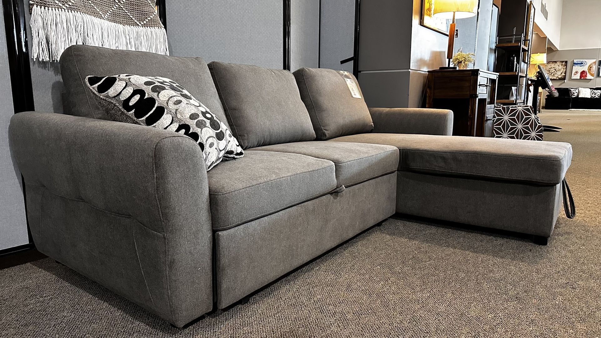 $10 Down with Easy Financing or $1299 gets this Brand New Top Quality Pop-Up Sleeper Sofa Sectional with Storage Chaise.