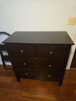 Gently used medium.brown dresser
