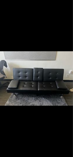 Black faux leather couch