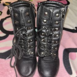 Women’s Black  high heeled boots size 7
