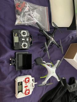 Three drones live feed camera headless mode extra propellers extra motors extra motor guards extra landing gear plus additional mini copter