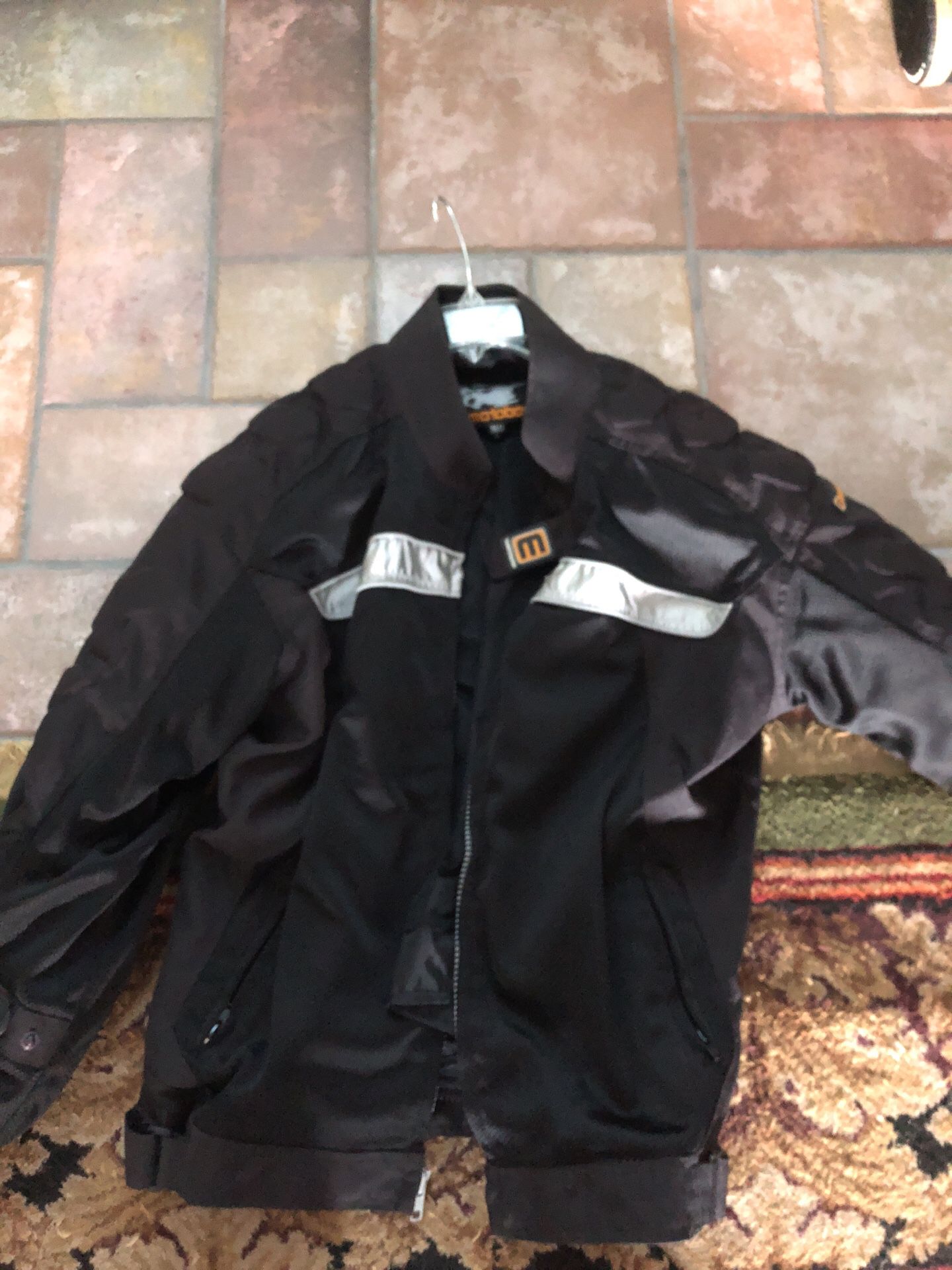 Weather protected motorcycle jacket