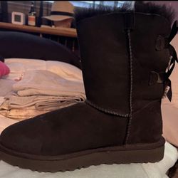 Never Worn Once.  Black 3 Bow UGGS. Size 7