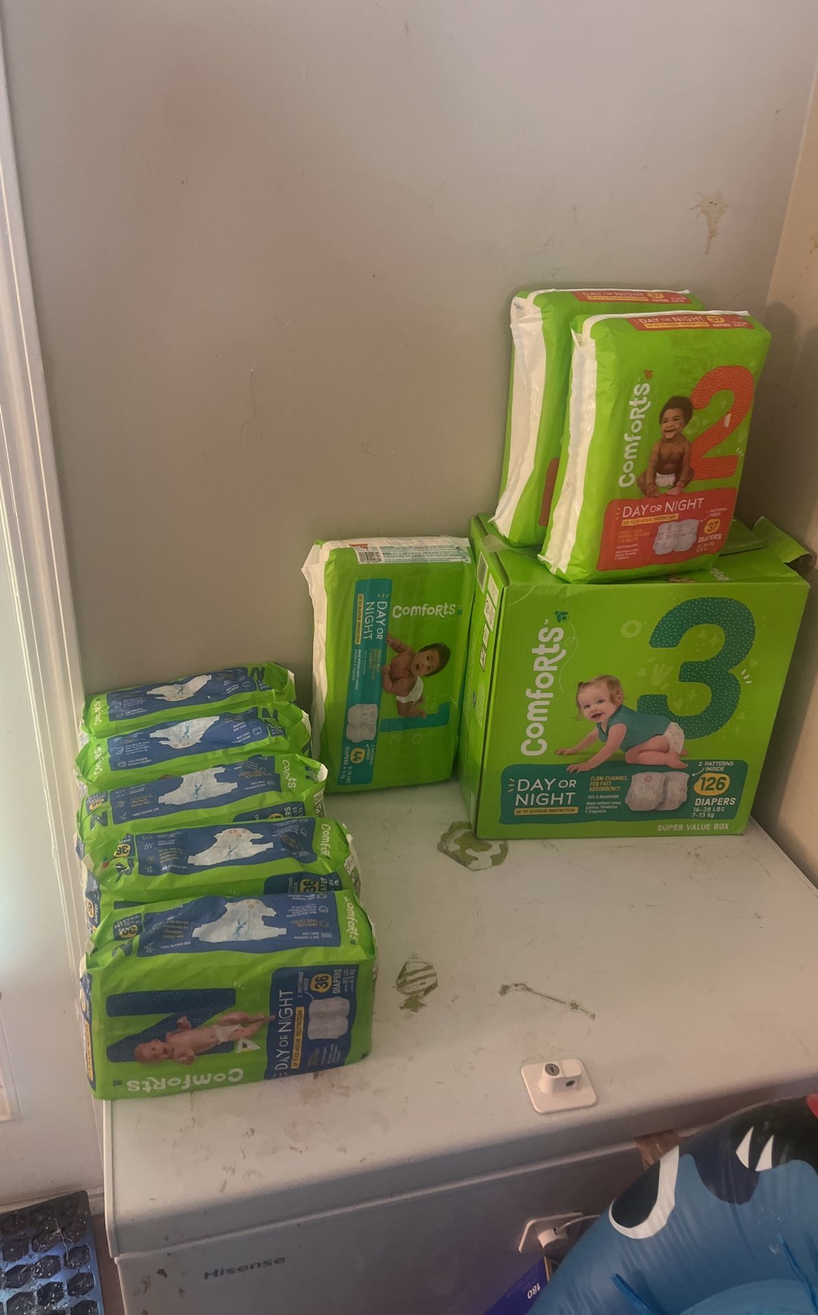 Size newborn in size 2 and three diapers