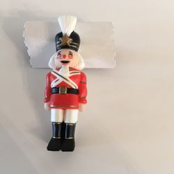 Hallmark Nutcracker Pin  2 1/5” High  Very Nice Condition  Vintage  Plastic  Has Original Price Tag