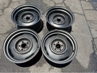 Staggered Mopar small pattern 15 inch steelies 5 on 4