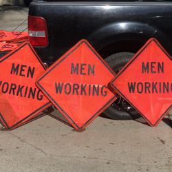 Men Working Signs