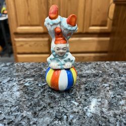 Vintage Ceramic Clown Balancing on Ball Pair of Salt & Pepper Shakers.  Preowned missing one stopper,  