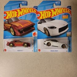 Hot wheels- ' Mazda Rx7/' Nissan Proto