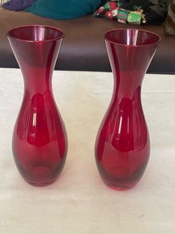 Pair of identical red glass fluted vases. 8” tall