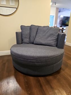 Beautiful blue fabric round rotating love sofa