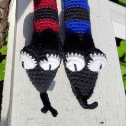 Hand crocheted snake approximately 26" long.  $8 each