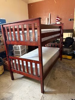 Bunk bed with mattresses