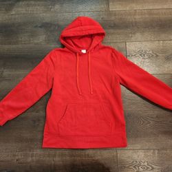Amzon Essential red pullover hoodie with a kangaroo pocket. good condition, size M 