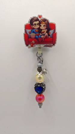 Wonder Woman and Superman Alligator Badge Reel
