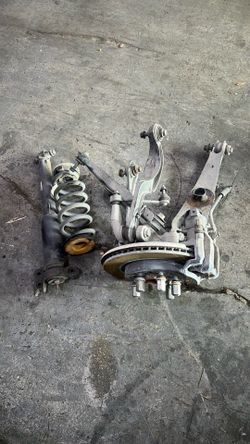 (753) 17-25 Cadillac Xt5 Left Rear Suspension Knee Assembly 2017 2018 2019 2020 2021 2022 2023 2024 2025