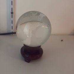 Frosted globe on wood stand