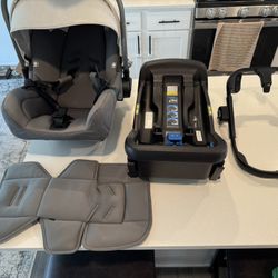 Nuna PIPA Infant Car Seat + Base + Stroller Ring Adapter – Premium Lightweight – Good Condition