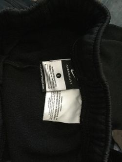 Pantalón deportivo Nike size large 10 y jeans Levi’s talla 12