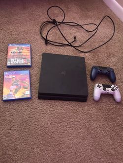 PS4 with controllers & games
