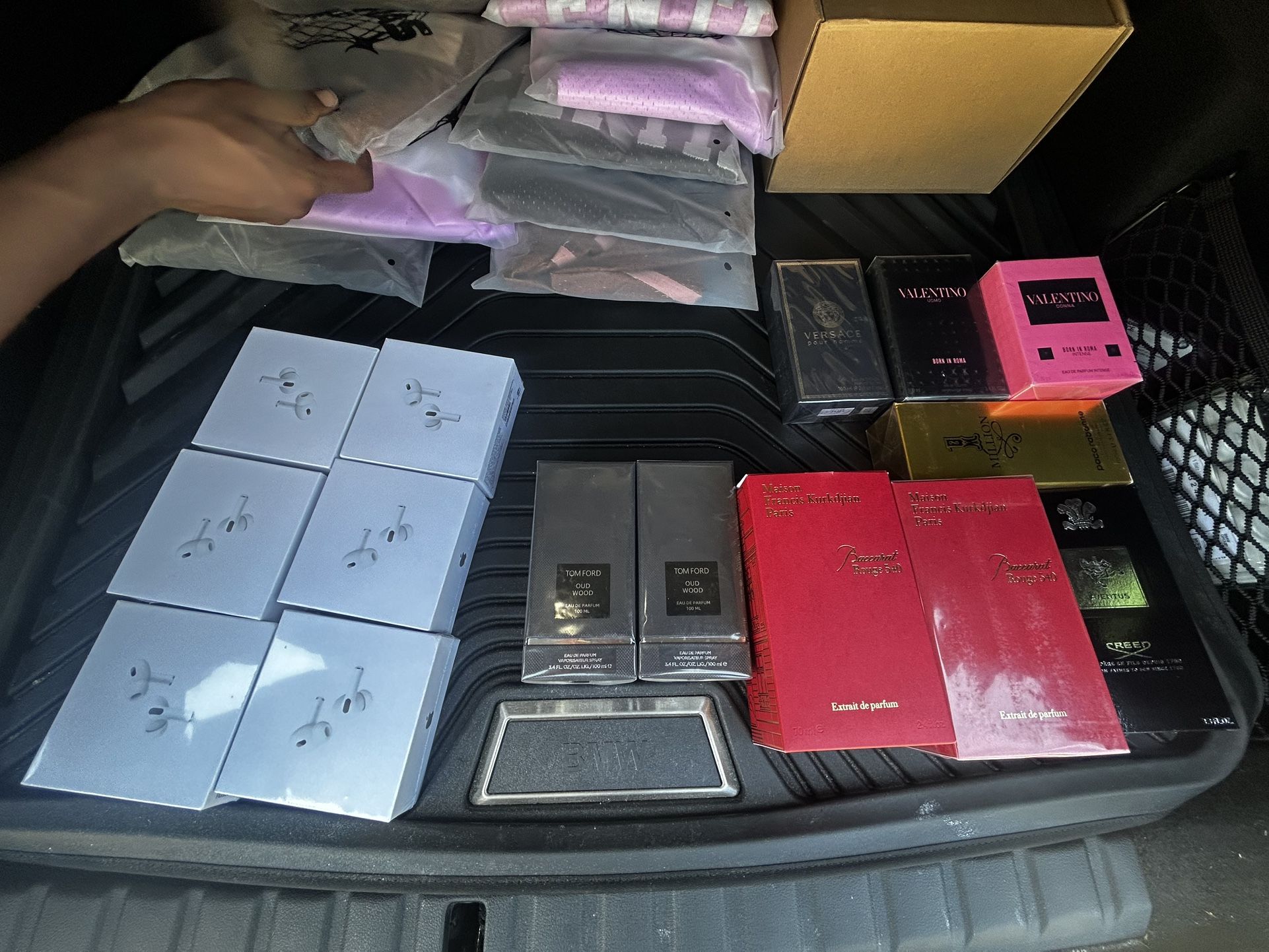 Colognes And AirPods With Clothing