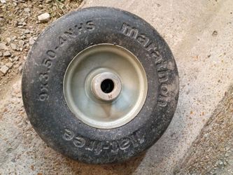 FLAT FREE 9×3.50 TIRE FOR A LAWNMOWER $30 (BRAND NEW)