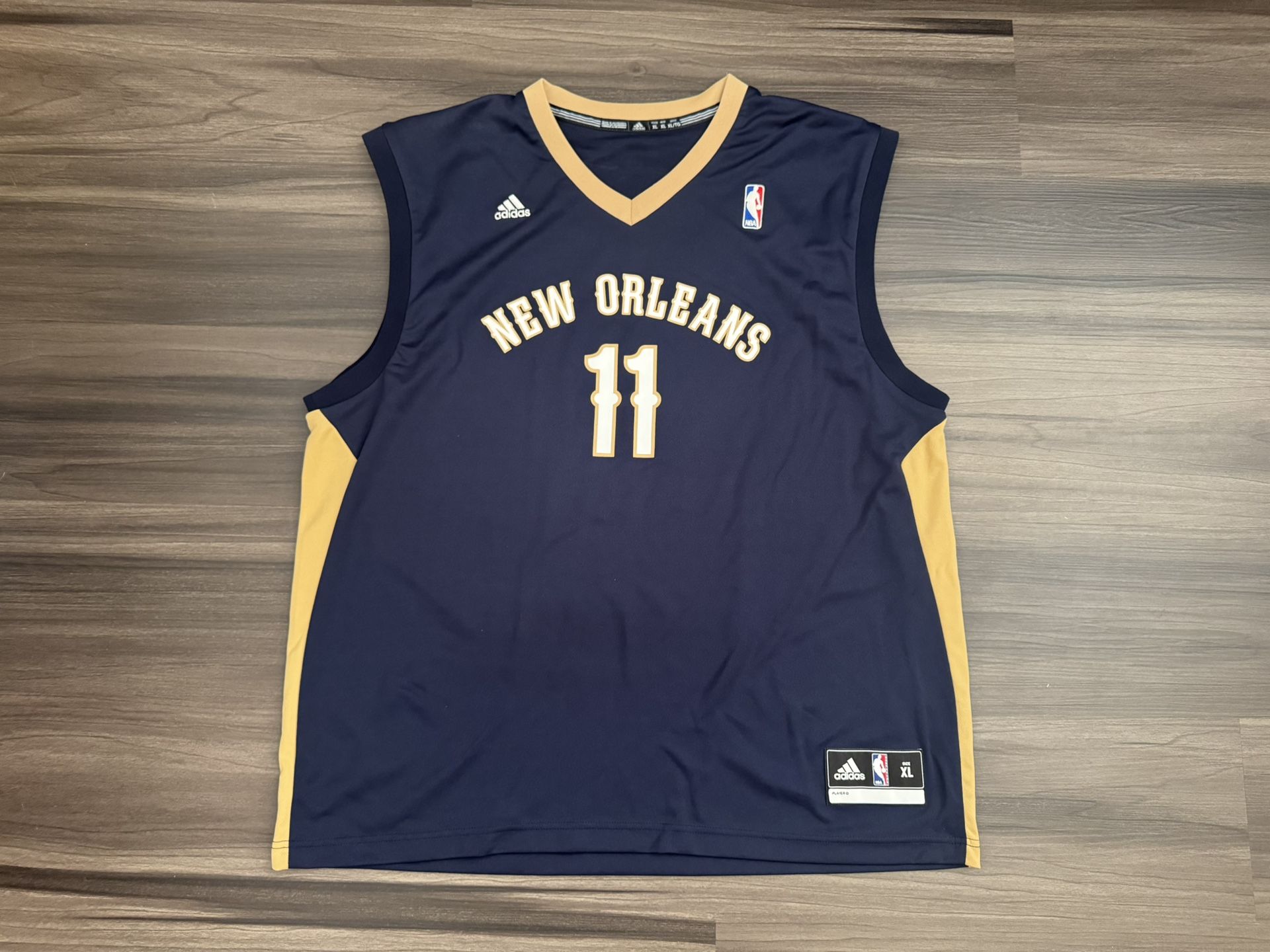 Adidas Jrue Holiday #11 New Orleans Pelicans NBA Basketball Jersey Men’s XL 100% authentic. Good condition. Lightly worn. The product is an officia