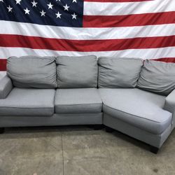 Free Delivery - Grey Sectional With Cuddler