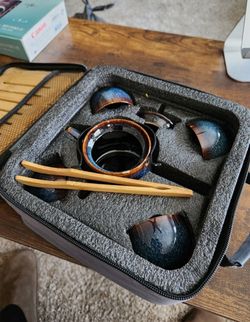 Portable Ceramic Kung Fu Travel Tea Set nestled securely in its custom shockproof foam travel case.