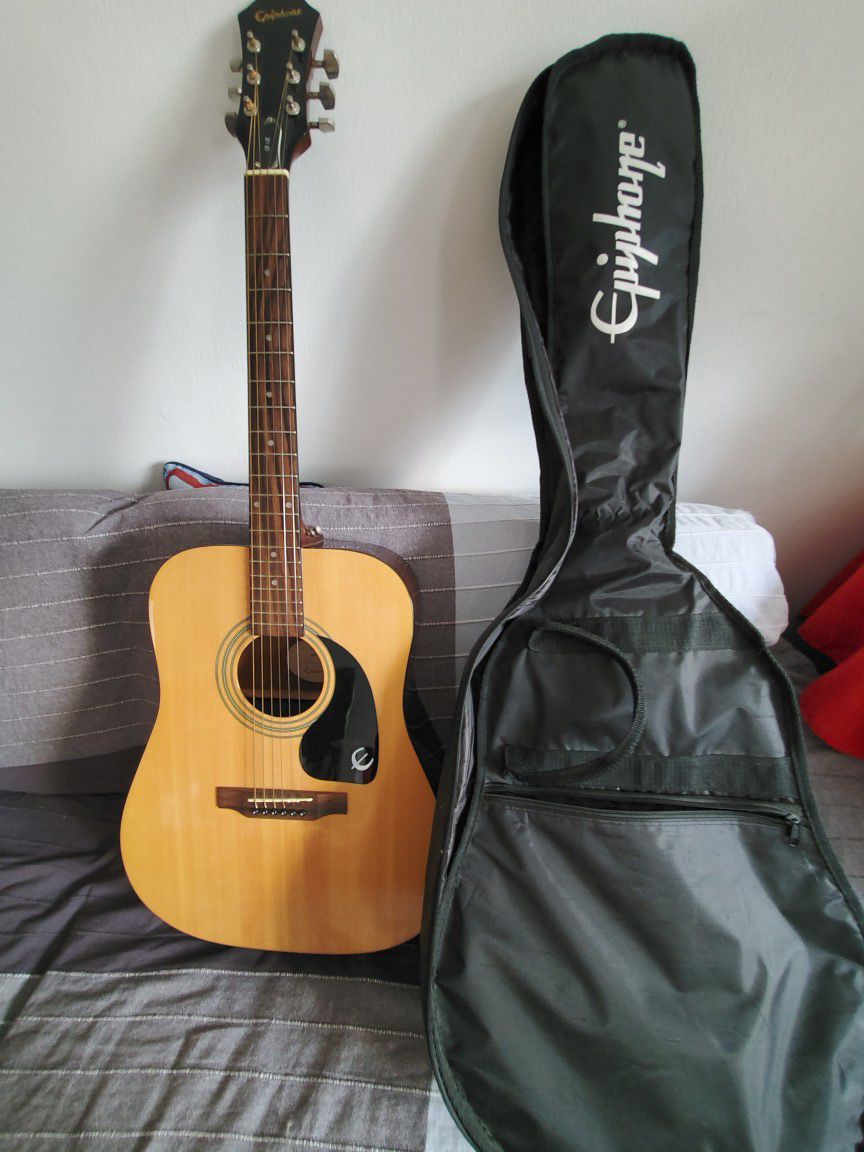 Acoustic Guitar and Guitar bag