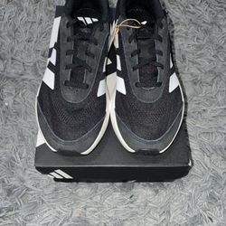 Size 8, men’s brand new unworn Adidas shoes with tags and box