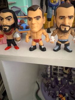Roman reigns, Gunther and cm punk mini figurines