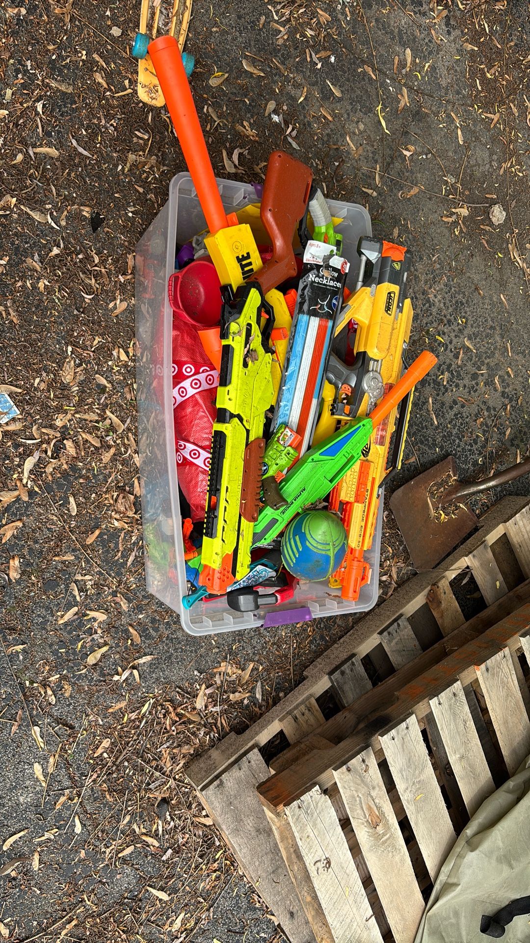 Bin of Nerf guns and other stuff
