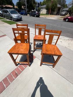 4 wood dinning chairs only