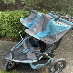 twin stroller travel system PEG City Loop Twin Stroller + Primo Viaggio Urban Mobility Baseless Infant  Car Seat Travel System Bundle