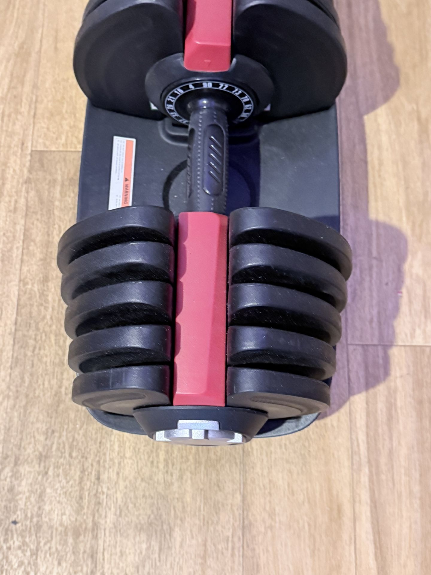 Set Of Adjustable Dumbbells And Bench