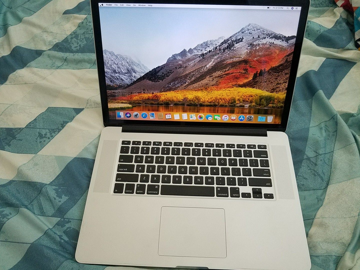 MacBook Pro 15inch Late 2013 Retina display with Intel core i7 , 8gb ram , 256gb SSD drive