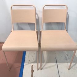 Pair of Blush Metal Stacking Chairs For Indoor Or Outdoor Use