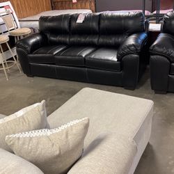Brand new sofa and loveseat $1000 for both pieces at your grab and go store