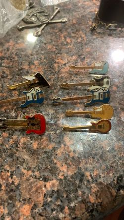 8 small brass electric guitar pins all for one price